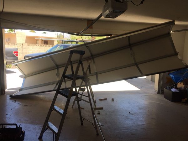 Garage door track installation by Nate's Garage Doors