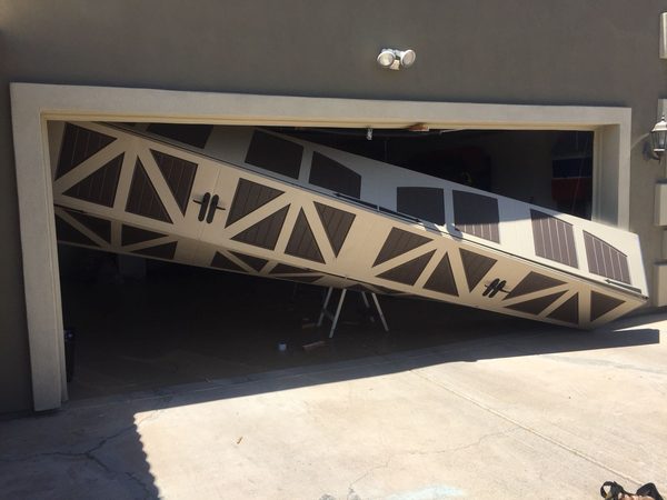Garage door track and spring work by Nate's Garage Doors